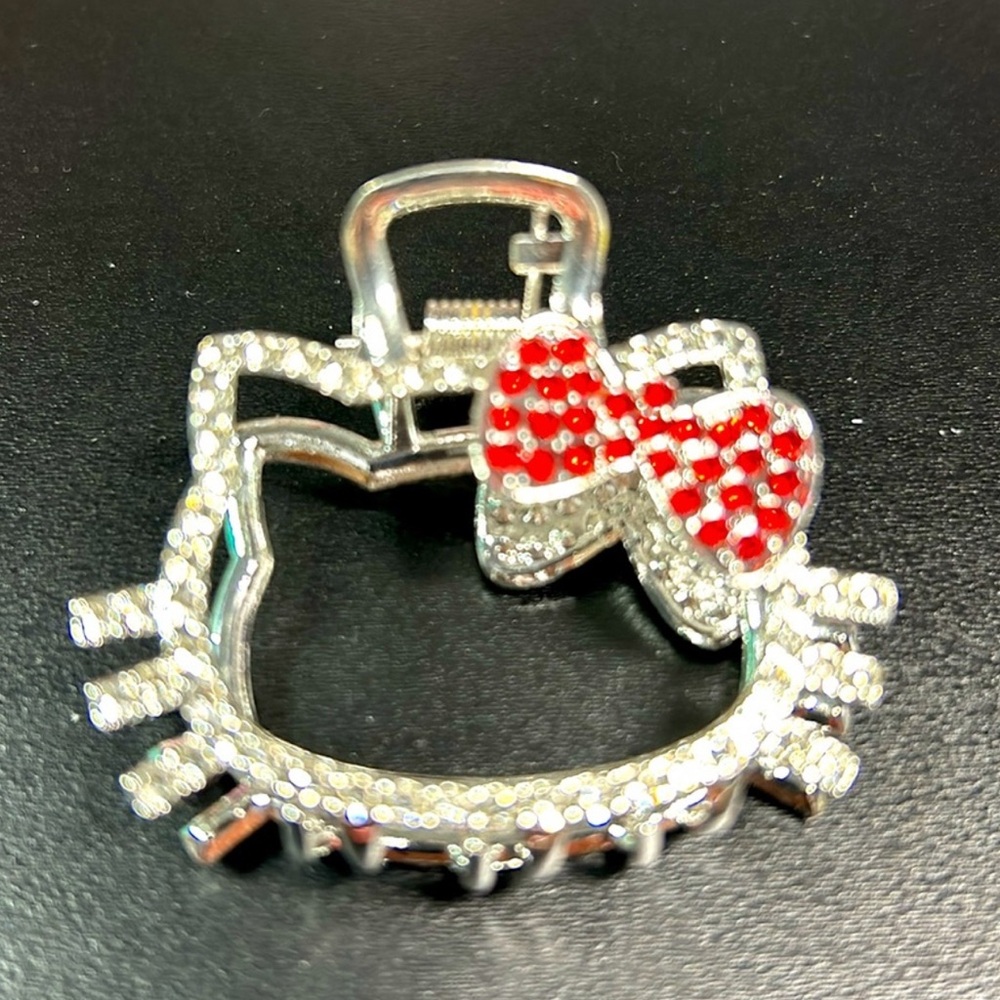 Hello Kitty Crystal Cat hair clip with Red Bow
Not Sanrio brand